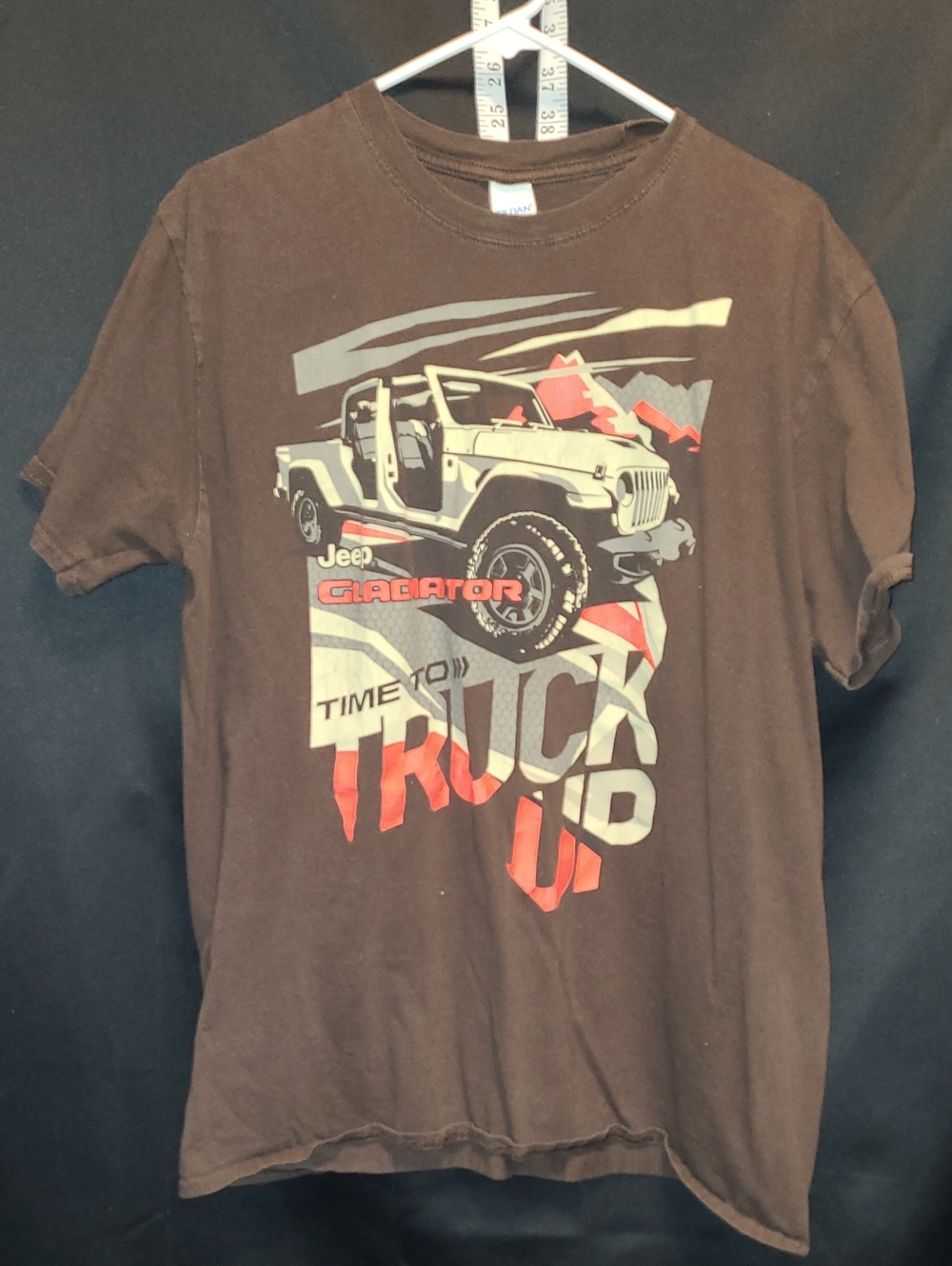 Jeep Gladiator truck illustration with the text "Time to Truck Up" on the front
